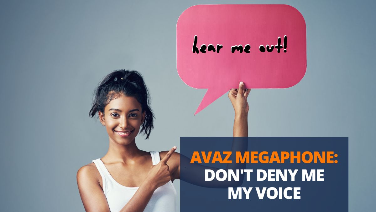 girl holding up speech bubble asking to hear autistic voices out